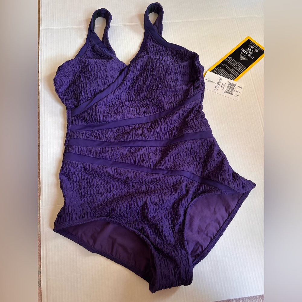 Miraclesuit Purple, One-Piece Swimsuit. Roushed and banded size 16W